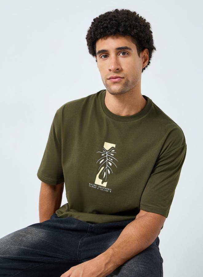 Styli Men Green Graphic Print Oversized T-Shirt - Image 4